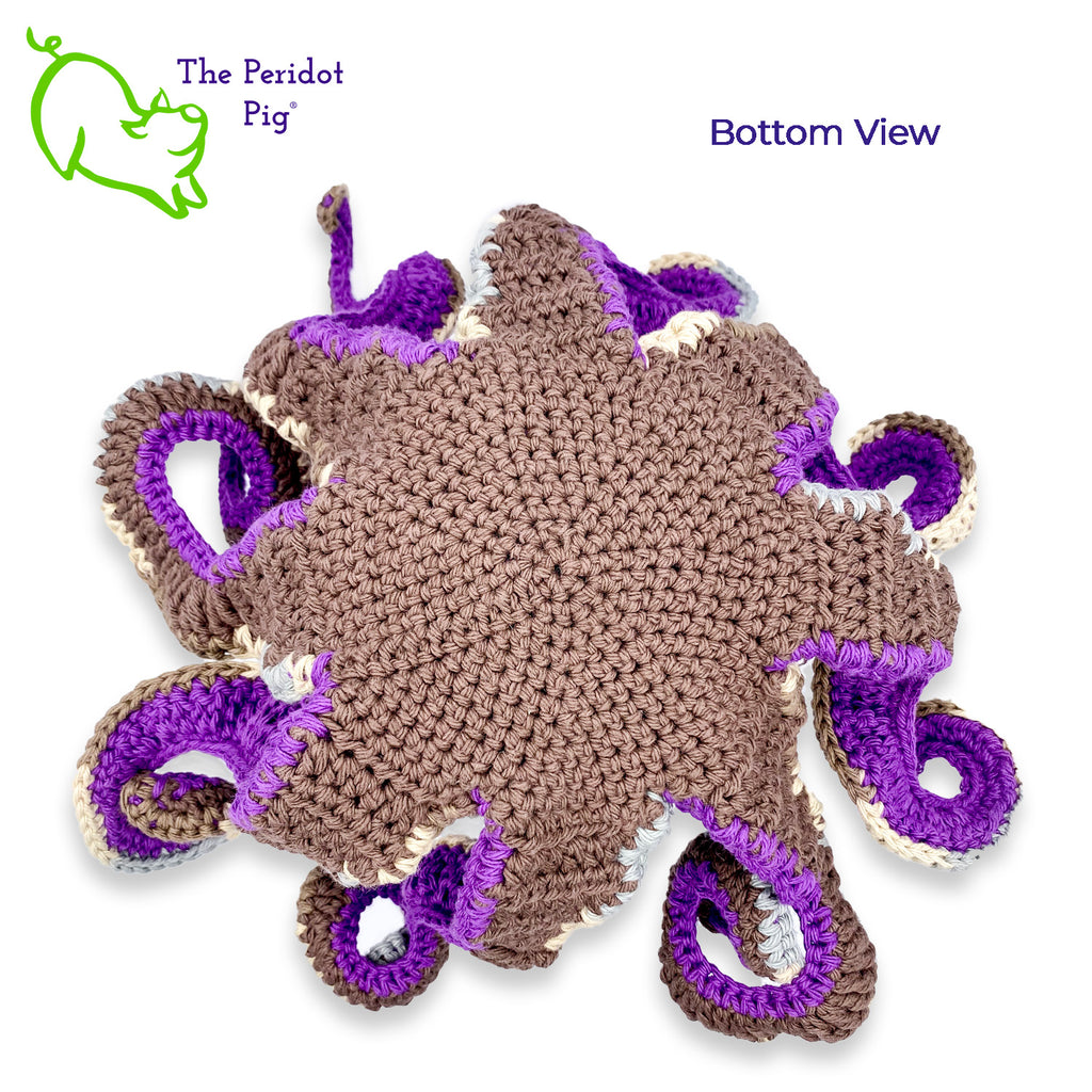 My husband thought an octopus only comes in black but we begged to differ! The North Pacific Giant Octopus is a lovely shade of orange like our Olivia. At first glance, she's a bit intimidating but in reality, she is soft and cuddly. Olivia is made from sturdy cotton and is meant to last a life-time. Also available in a purple too! Bottom view shown in purple.