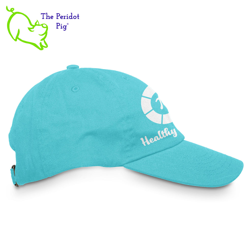 Stay shaded and stay styling with the Healthy Pi Logo Dad Hat! This 6-Panel twill cap is one cool customer - perfect for adding a bit of chill to your look and keeping the 'pony' under wraps. Available in FIVE colors, you'll be 'hat-happy' no matter which you choose! Right view shown in teal.