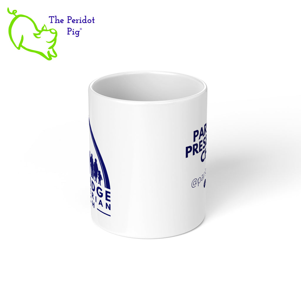 Introducing the stylish Park Ridge Presbyterian mug! Crafted from glossy white ceramic and proudly displaying their logo and name on both sides, this classic mug is the perfect addition to any kitchen. Center view shown.