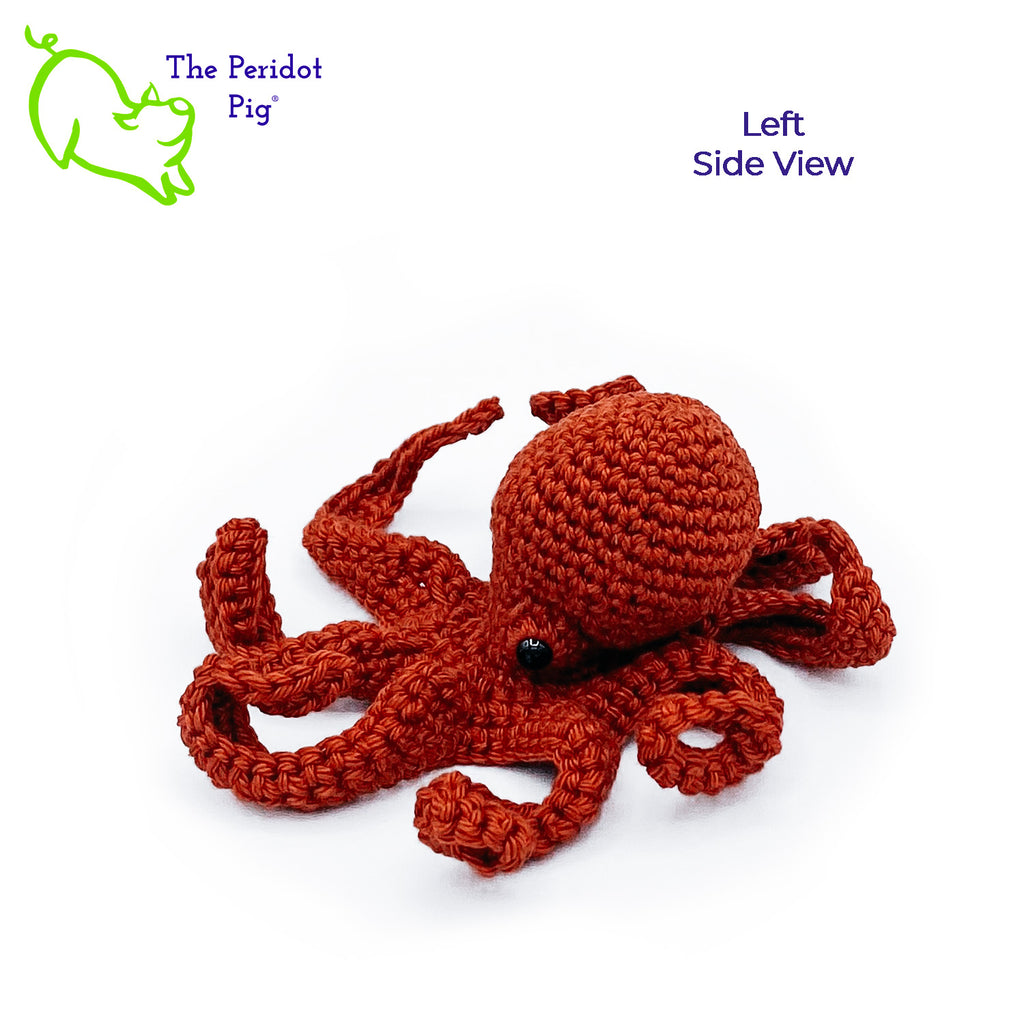 Leggy is made from sturdy cotton and is meant to last a life-time.  The safety eyes are securely attached, but for children under 3 please use with supervision. Left view shown in orange.