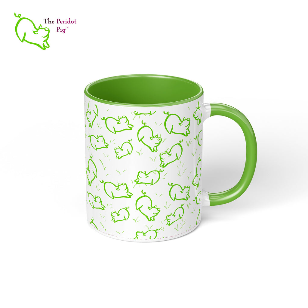 Peri's perky little peridot self is frolicking across this mug. Frolicking so much that you have to call it dancing a pig jig. This bright green mug is sure to brighten the start of your day. Right view
