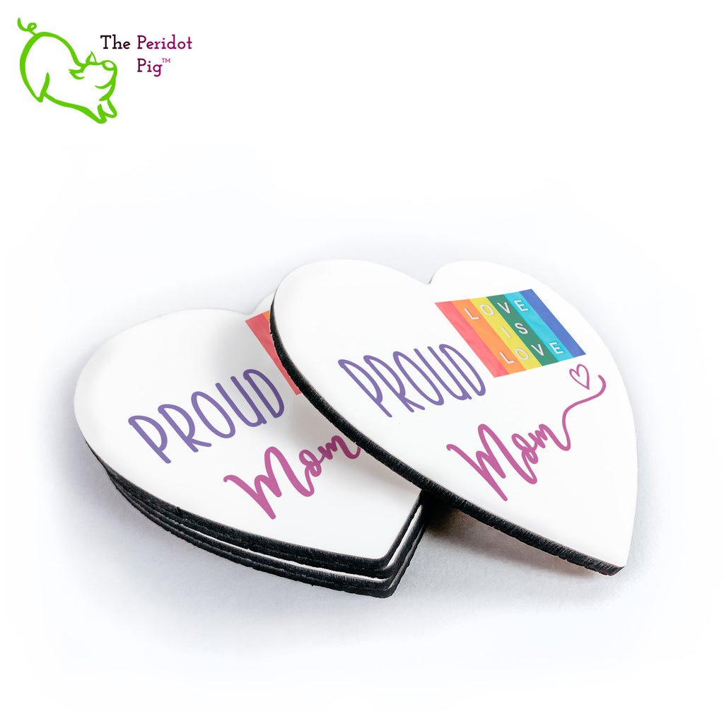 This set of four heart-shaped coasters is the perfect gift for your LGBTQA Mom. Each is printed with saying Proud Mom and a Love is Love rainbow flag. The coasters are printed in a durable ink that won't fade over time. Shown in a stack with one to the right.