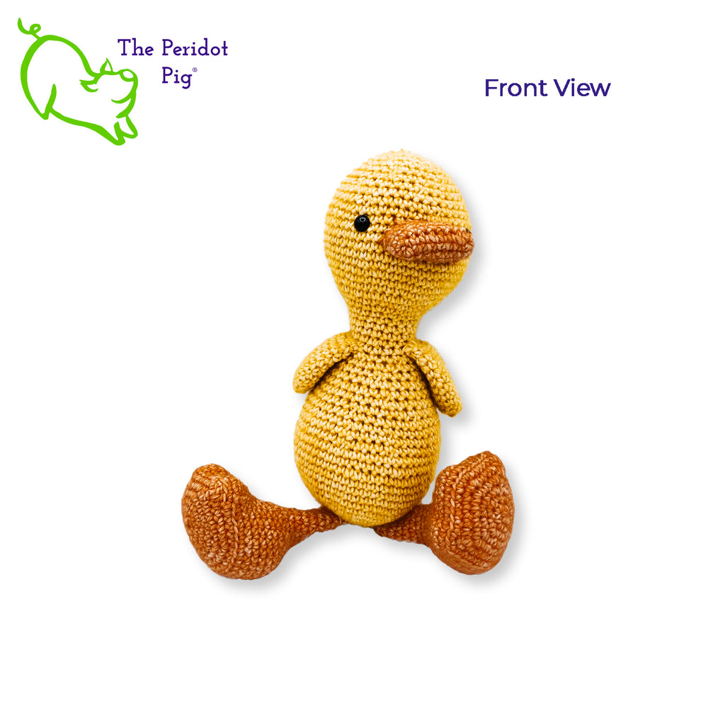 Susie is a rather serious little duckling. The gleam in her eyes, the slight tilt to her head. She's intensely focused. But it's the big duck feet that make her so cute! She's hand crocheted out of a soft cotton/acrylic blend and will last a lifetime. She's stuffed enough that her head stays upright but her legs are floppy enough to have her seated. Front view - seated shown.