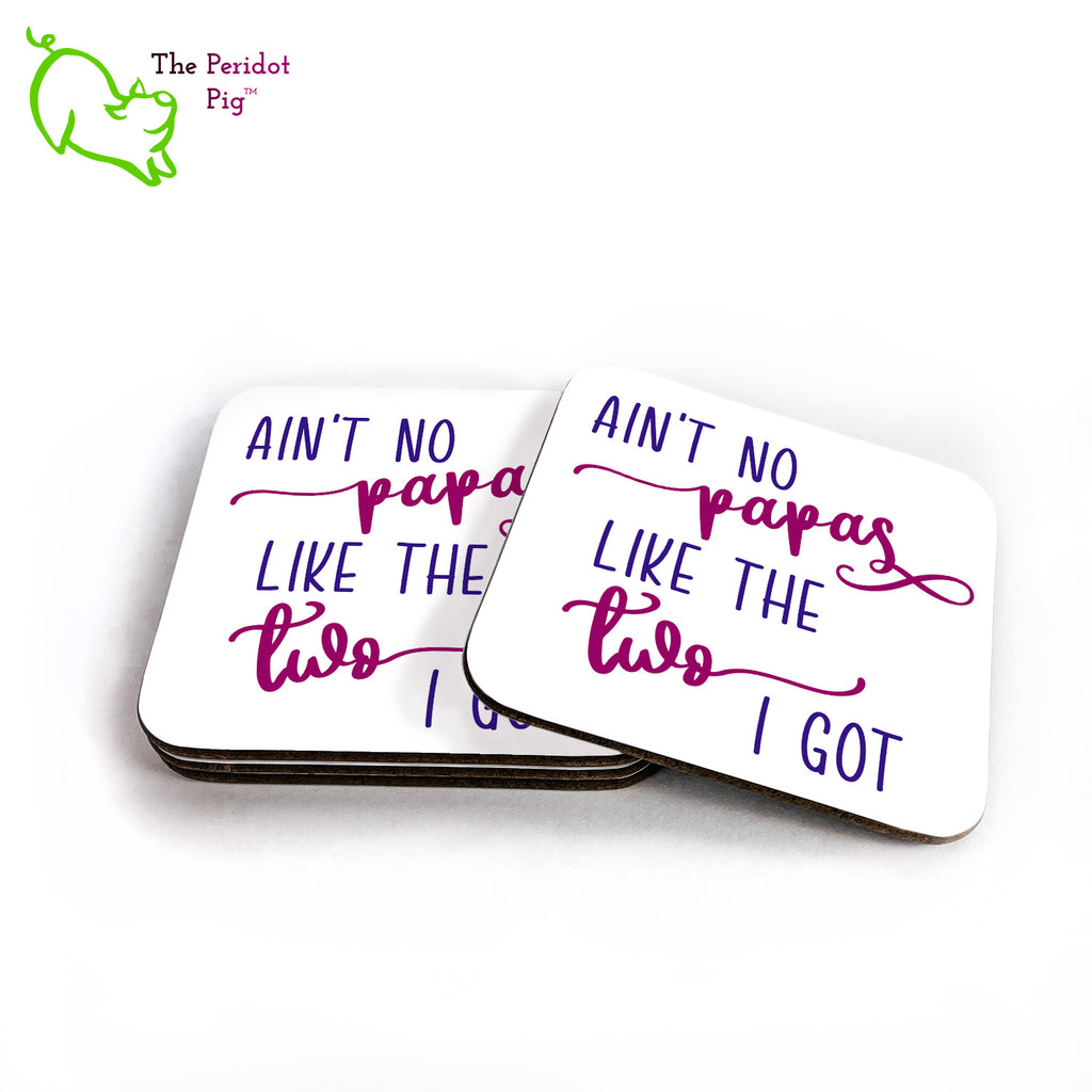 So the grammar isn't the greatest but aren't these coasters cute? Show your pride for the wonderful dads you have! This set of four square coasters is printed in bright colors on either a matte or a gloss coaster. They simply state that "Ain't no papas like the two I got" in bright purple colors. Shown in a stack with one to the right.