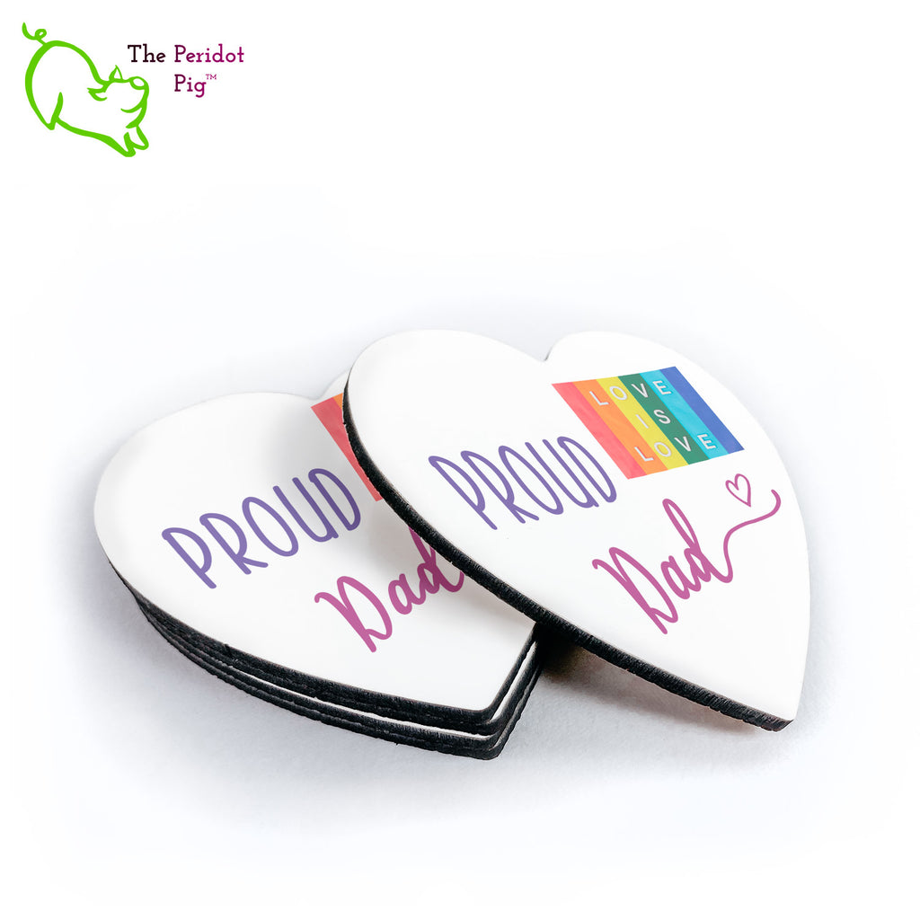 This set of four heart-shaped coasters is the perfect gift for your LGBTQA Dad. Each is printed with saying Proud Dad and a Love is Love rainbow flag. The coasters are printed in a durable ink that won't fade over time. Shown in a stack with one to the right.