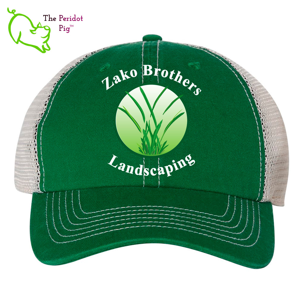 The perfect hat if you're out in the sun and weather all day. Shade in the front and cool mesh in the back. This hat features the Zako Brothers company logo and the words, "Zako Brothers Landscaping" in white lettering. Front view.