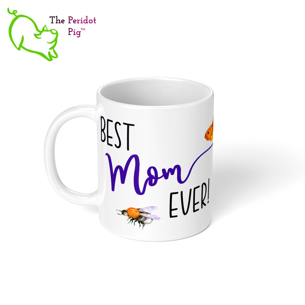 Whether you have two moms or four, this fun little mug is the perfect gift. Celebrate Mother's day with a gift that embracees a modern family! The mug says, "Best Mom Ever!" on the front. On the back, it says "Shhh...don't tell my other mom". Decorated in fun fonts with a cute little bee, moth and caterpillar. Left view.