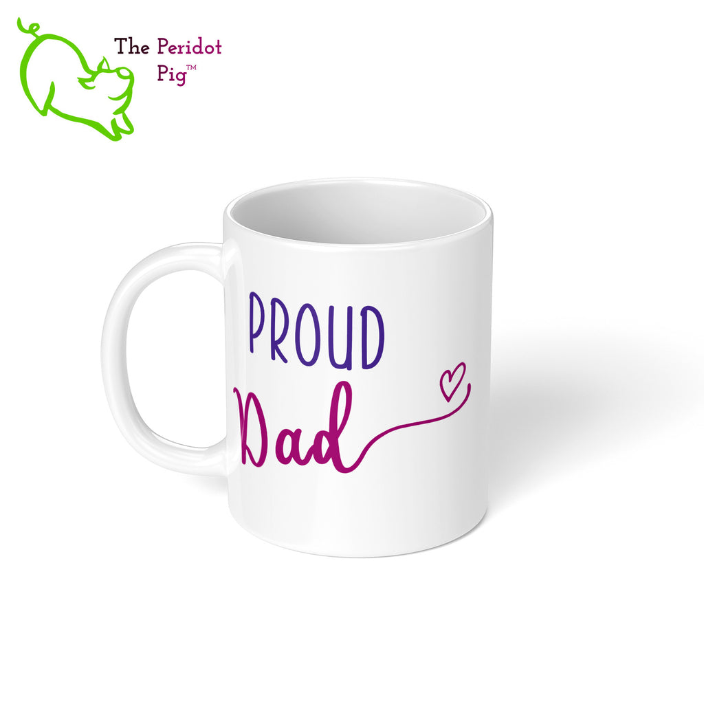Celebrate Father's day with a gift that embraces your pride. The mug says, "Proud Dad" on the front. On the back, it has rainbow stripes with the saying, "Love is love". Left view.