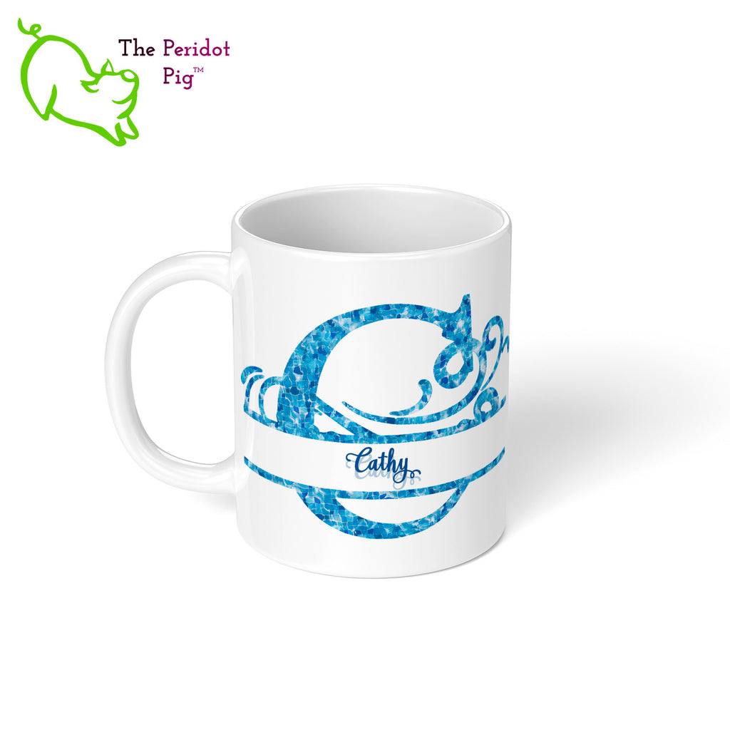 Sometime you just need a mug that screams, "hands off, Rob, that's MY mug!".  What better way than with a large monogram on both sides of this 11 oz mug. The monogram and print is in a bright cheerful tropical waters blue pattern. Left view with example text.