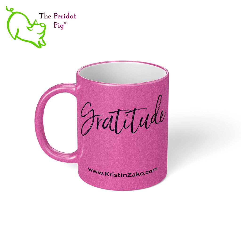 This beautiful magenta shimmer/metallic mug is so pretty! It's sturdy and glossy with a vivid print that'll withstand the microwave and dishwasher. The front and back feature the word, Gratitude along with Kristin's website URL, www.KristinZako.com. Left view.