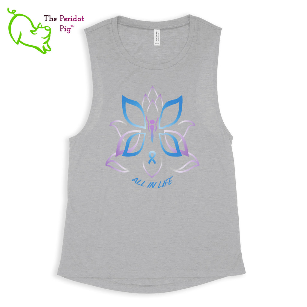 This comfortable muscle tank is soft and flowy with low cut armholes for a relaxed look. The shirt features Kristin Zako's logo on the front in bright blue and purple colors. The back is blank. The print is a translucent, faded "vintage" look due to the blend of the fabric. Front view in Heather Athletic.