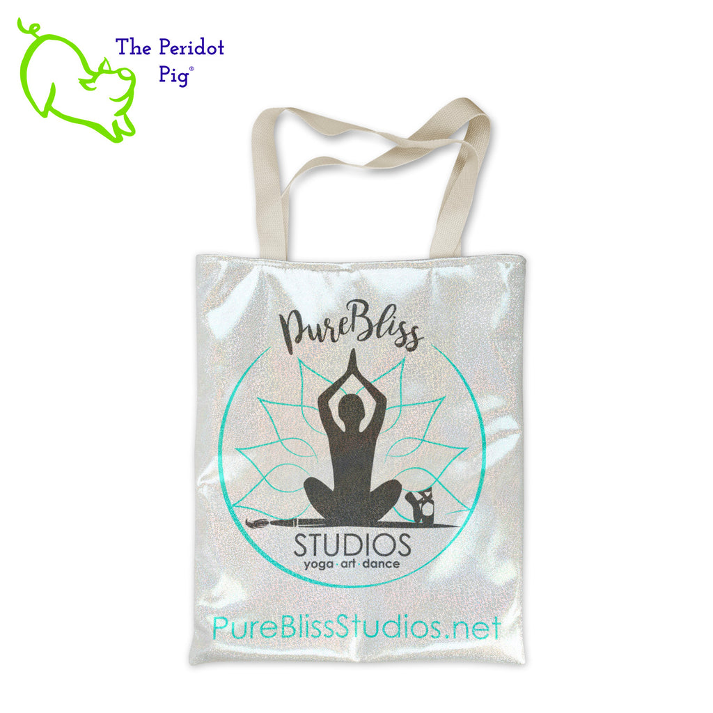 A shimmer tote bag is a must-have accessory to help carry everything you may need. This champagne color tote has a holographic sparkle to it but is still really soft. We've added the PureBliss Studios logo to the front of this great tote! Front view shown.