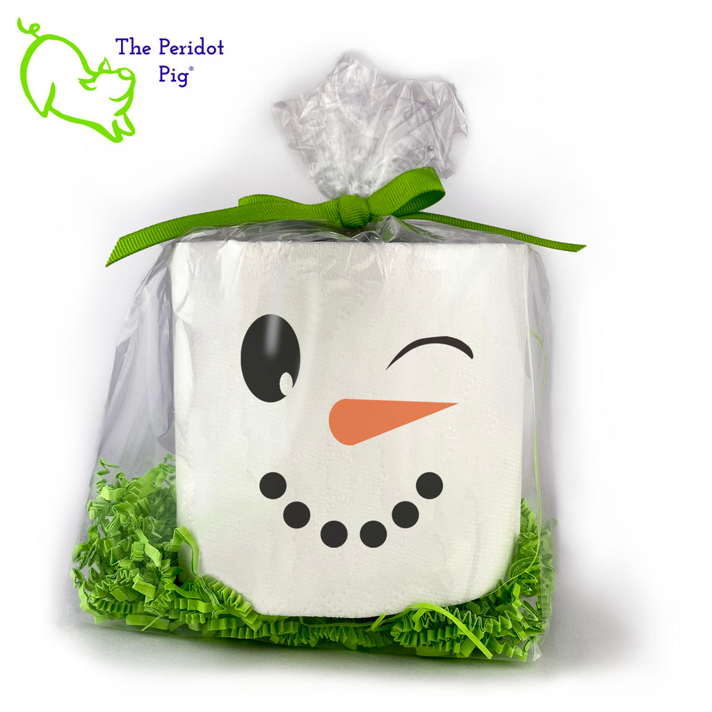 this listing is for a single, high-quality 2-ply toilet paper roll which has been printed in vivid sublimation color. We then wrap it all up with some peridot green crinkle paper and a matching bow. This version has the silhouette of a cute snowman with a cheeky wink. Front view shown.