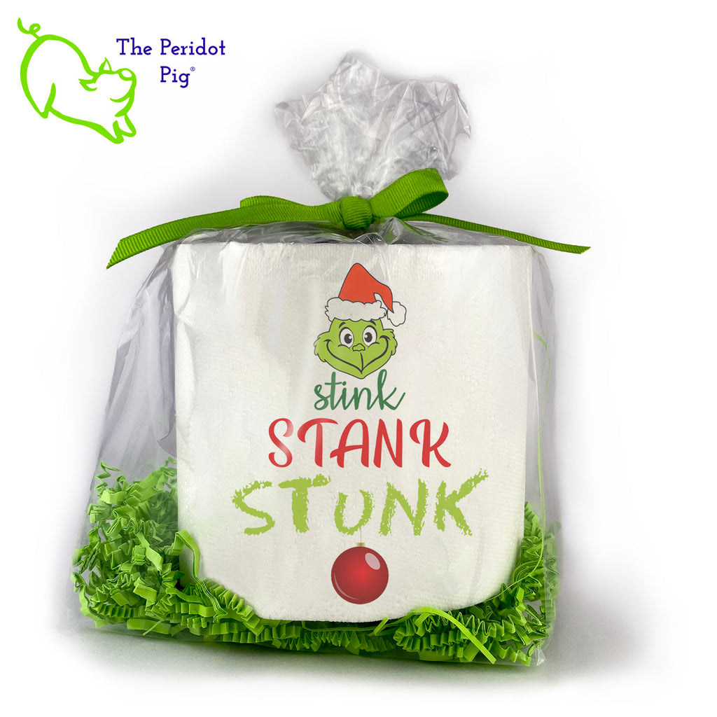 Available with many different sayings, this is high-quality 2-ply toilet paper which has been printed in vivid sublimation color. We then wrap it all up with some peridot green crinkle paper and a matching bow. This version states "Stink Stank Stunk" with a Grinch and an ornament. Front view.