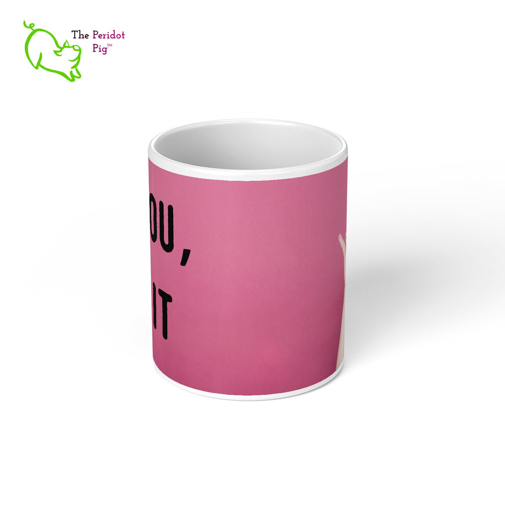 Our 11 oz coffee mug has the printed phrase, "Love You, Mean It" one one side and the raised hand on the other spelling "I love you" in ASL. center view.
