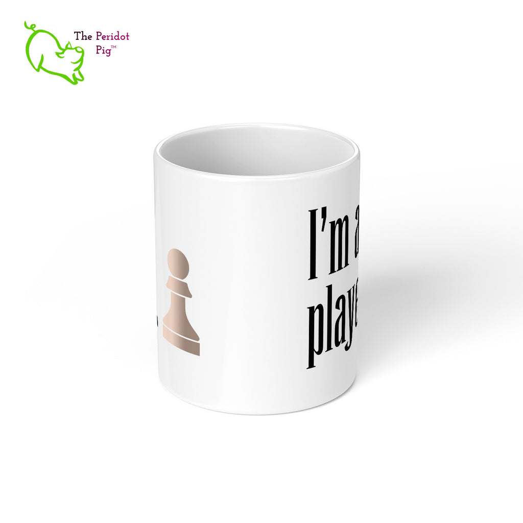These bright white mugs are perfect for the chess fan. Pawn - I'm a player. Center view.
