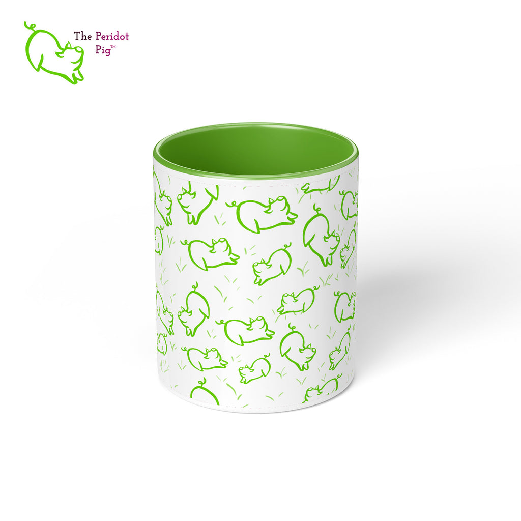 Peri's perky little peridot self is frolicking across this mug. Frolicking so much that you have to call it dancing a pig jig. This bright green mug is sure to brighten the start of your day. Center view