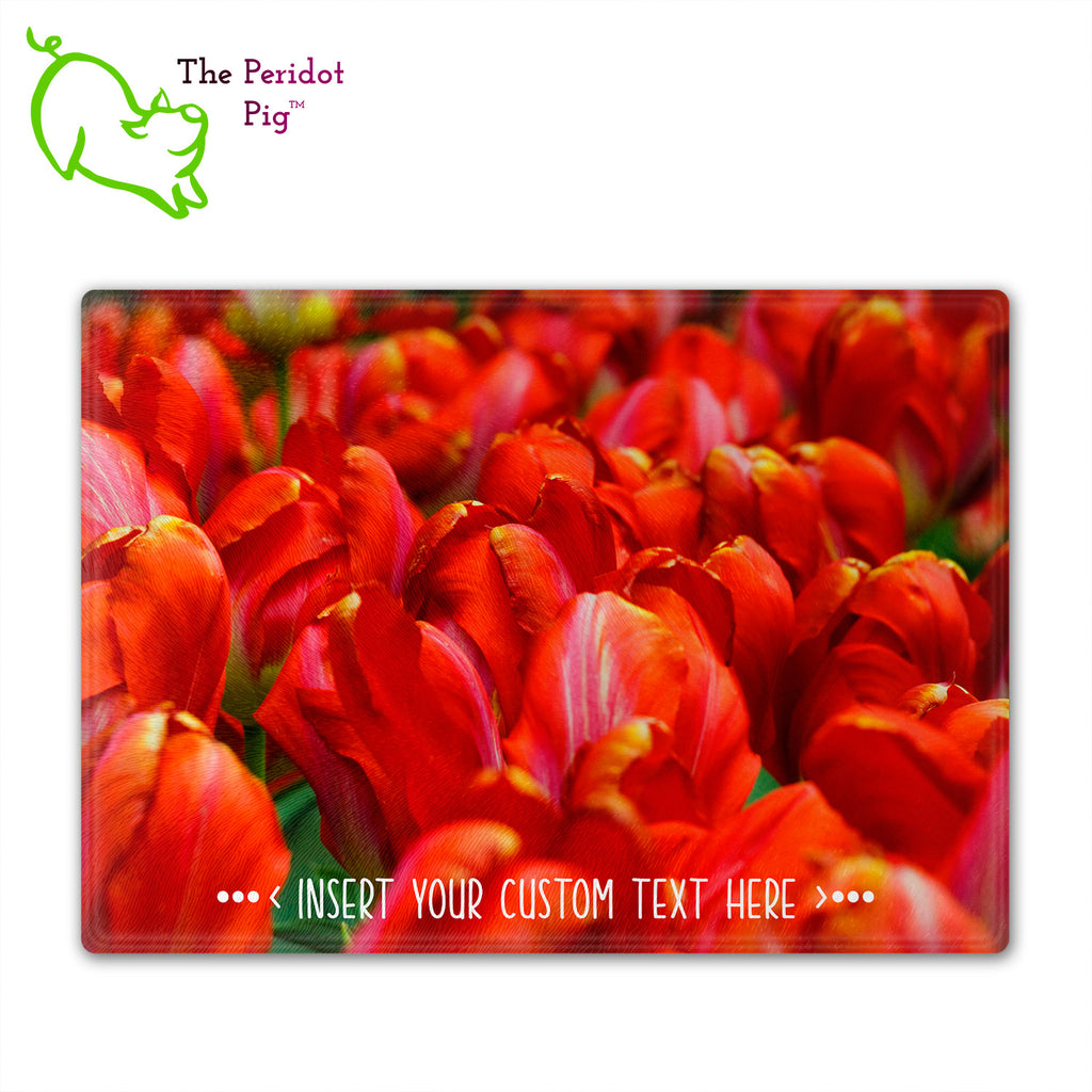 These beautiful tempered glass cutting boards are a wonderful keepsake!  They can be personalized with names, quotes or dates. This one features a field of bright red tulips in a vivid and detailed print. Perfect for cutting or using as a serving board! Front view without highlights.