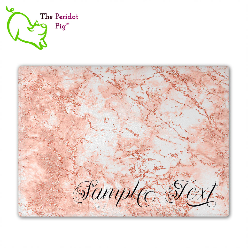These beautiful tempered glass cutting boards are a wonderful keepsake!  They can be personalized with names, quotes or dates. These feature swirling marbles in rose gold and glitter foil in a vivid and detailed print. We prefer a scrolling script for the personalization in this design. There is also a little bling under the name included too. Front view with sample text with no highlights. Style C