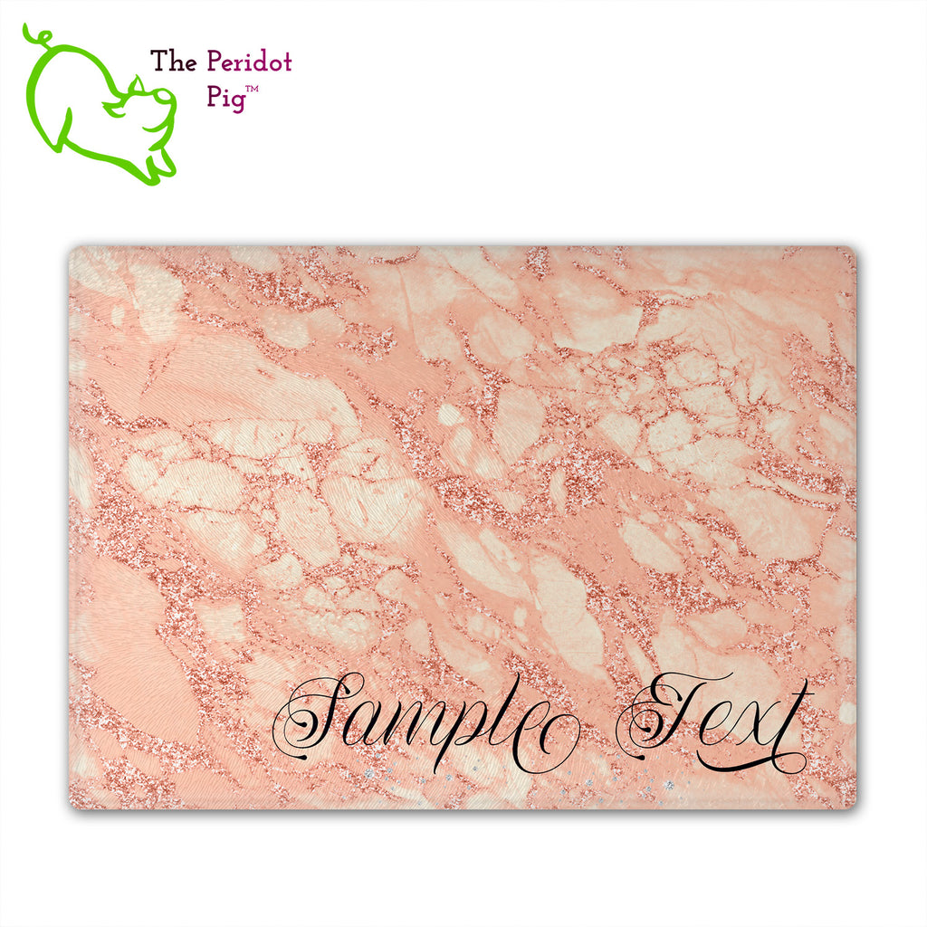 These beautiful tempered glass cutting boards are a wonderful keepsake!  They can be personalized with names, quotes or dates. These feature swirling marbles in rose gold and glitter foil in a vivid and detailed print. We prefer a scrolling script for the personalization in this design. There is also a little bling under the name included too. Front view with sample text with no highlights. Style D