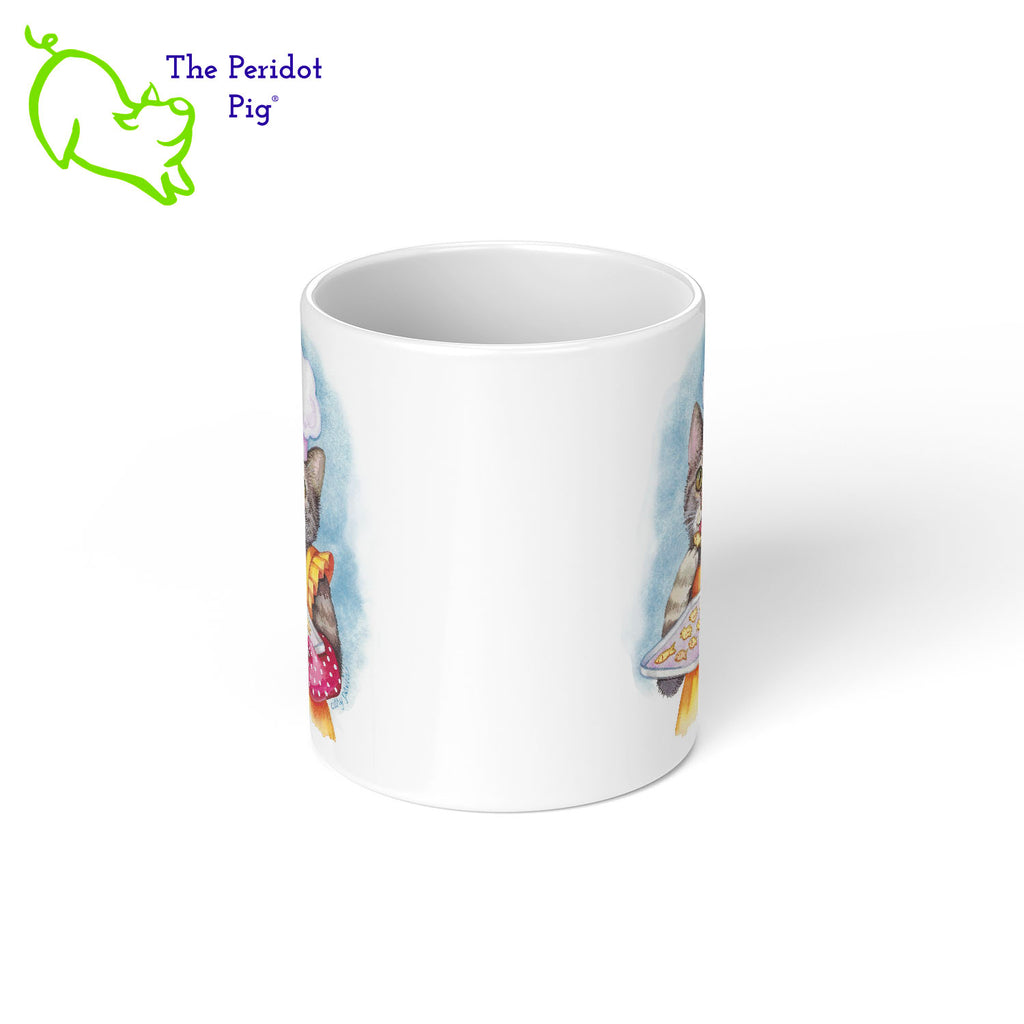 This 11 oz ceramic mug features the colorful artwork of Cathy Pavia and would be the perfect gift for a cat lover or chef. You have a cool cooking kitty on the front, baking some little kitty snacks. They're dressed in a bright apron, chef's hat and a polka dot oven mitt. On the back is the same image. Shown center view.
