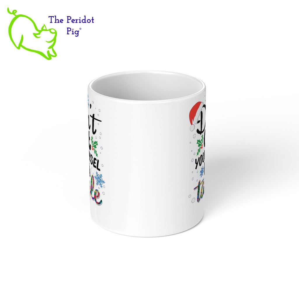 The holidays can be stressful. Tell them all to chill with your special mug. This one is printed on the front and back with vivid permanent colors. It says, "Don't get your tinsel in a tangle". Center view shown.
