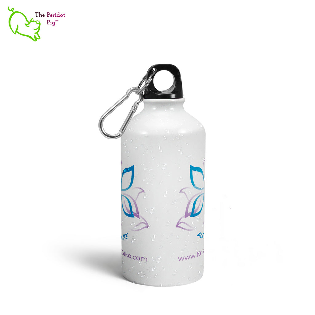 This glossy white water canteen features Kristin Zako's logo on both sides. It has a screw top with a replaceable gasket and a carabiner to attach to your backpack. Side view.