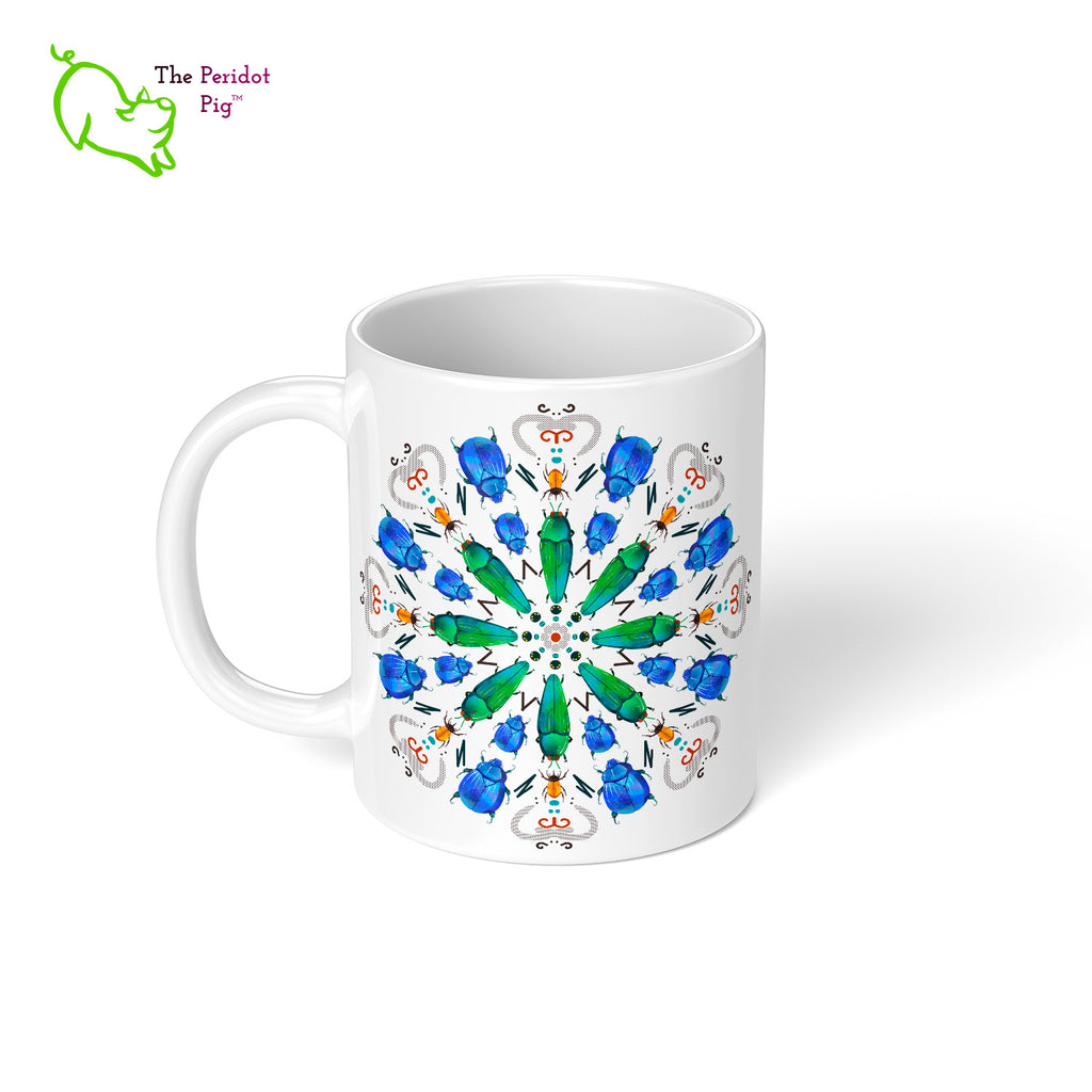 A colorful mandala of beetles graces this 11 oz mug. The center beetles have shades of bright green.  The smaller beetles are blue and orange. Printed on a glossy white mug, these bugs really pop! Left view.