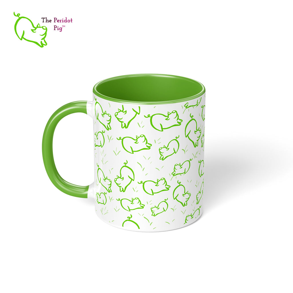 Peri's perky little peridot self is frolicking across this mug. Frolicking so much that you have to call it dancing a pig jig. This bright green mug is sure to brighten the start of your day. Left view