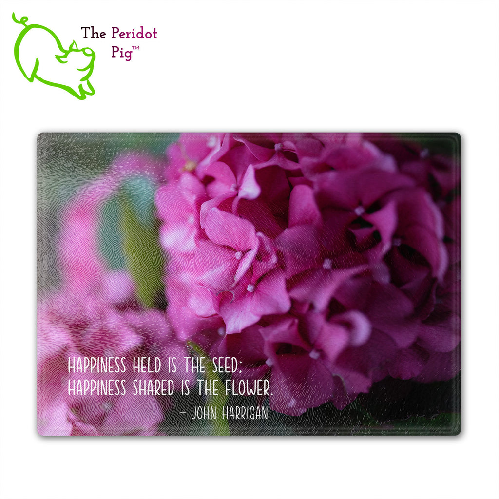These beautiful tempered glass cutting boards are a wonderful keepsake!  They can be personalized with names, quotes or dates. This one features bright purple pink hydrangeas in a vivid and detailed print. Perfect for cutting or using as a serving board! Fron view with a sample quote.
