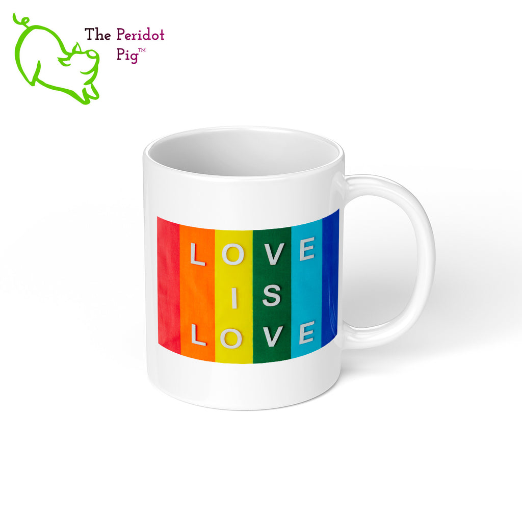 Celebrate Mother's day with a gift that embraces your pride. The mug says, "Two moms are better than one!" on the front. On the back, it has rainbow stripes with the saying, "Love is love". Right view.