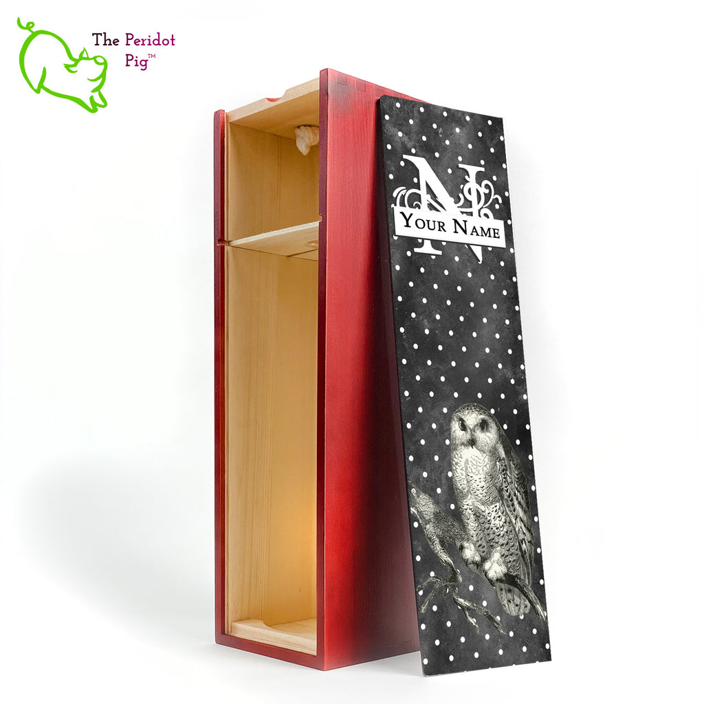 The wine box front panel is decorated in a glossy, detailed print with a white monogram and space for a customized name. This model has a smokey dark gray background with a pattern of white dots. In the foreground is a large black line drawing of an owl. Cherry version showing the interior.