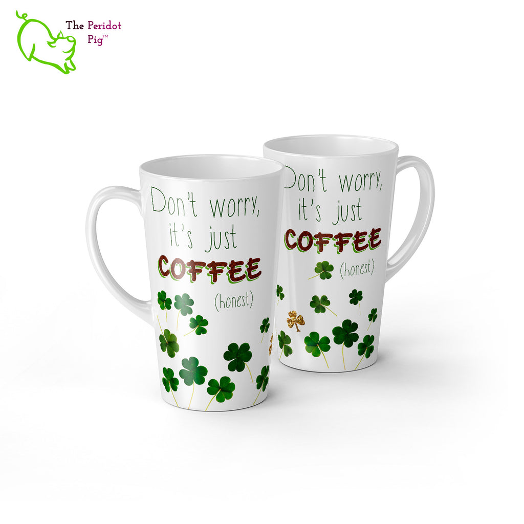 A 17 oz white latte mug. Perfect for an Irish Coffee or a regular cup o'joe. The caption reads, "Don't worry, it's just coffee (honest)" set amid a collection of shamrocks. Front and back view.