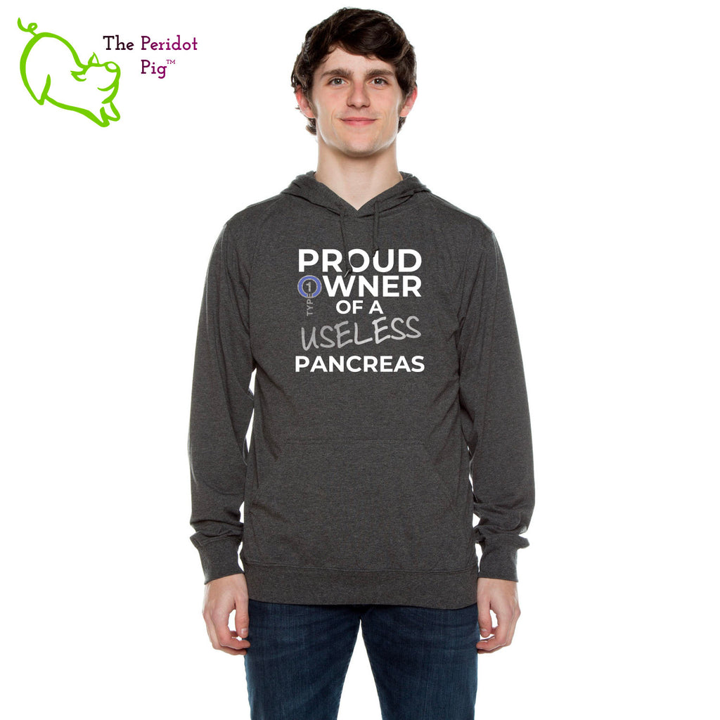 Our Type 1 Diabetes "Proud Owner of a Useless Pancreas" long sleeve t-shirt hoodie is a light-weight version of your classic pullover hoodie. The front features the saying "Proud owner of a useless pancreas" with our take on the Type 1 Diabetes logo. The back is blank. The image is a very thin, soft vinyl primarily in white. The outline of the logo and "useless" are in silver with a touch of blue in the diabetes circle. Front view shown on a model.