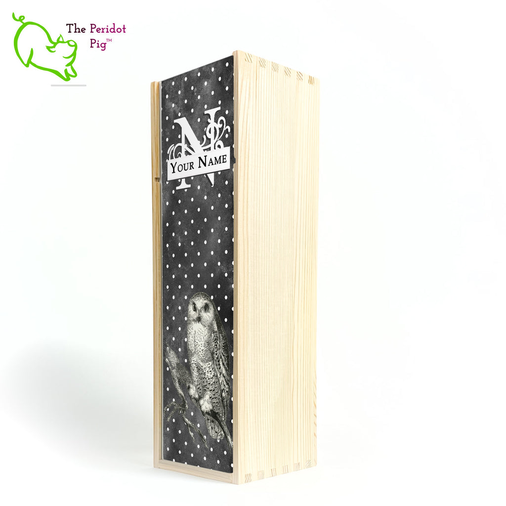 The wine box front panel is decorated in a glossy, detailed print with a white monogram and space for a customized name. This model has a smokey dark gray background with a pattern of white dots. In the foreground is a large black line drawing of an owl. Natural version front view.