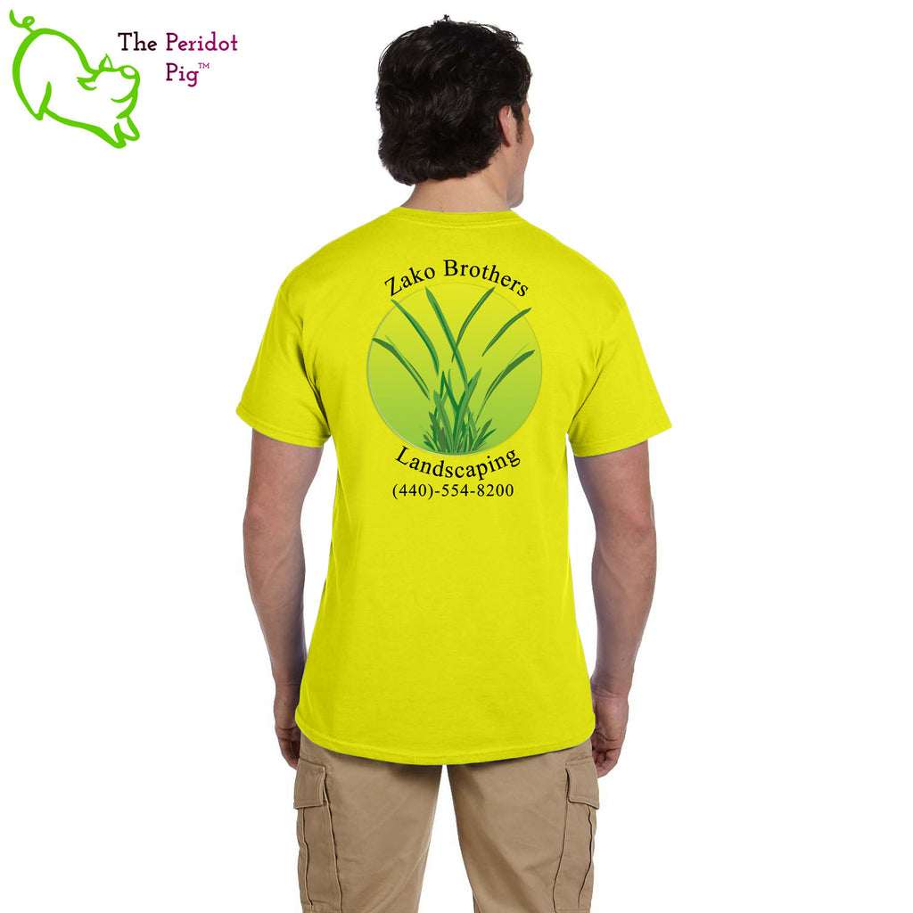 A saftey green short sleeve t-shirt featuring the Zako Brothers logo on the left shoulder area. A larger version of the logo is printed on the back. Back view.