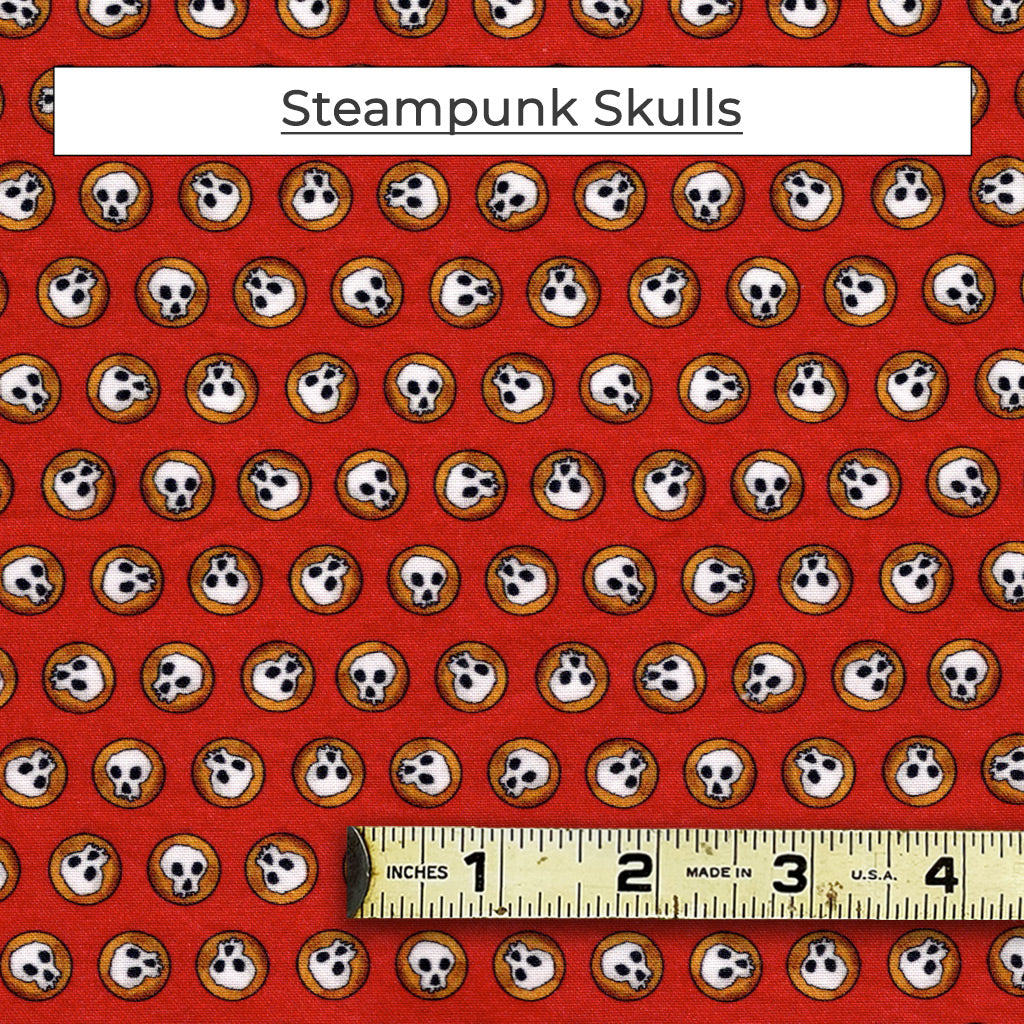 A mixed color fabric with a red background and tiny little skulls in dark gold circles called Steampunk Skulls.