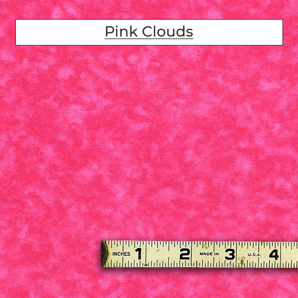 The Pink Clouds fabric is a bright pink with subtle cloud swirls. It reads as pink from a distance.