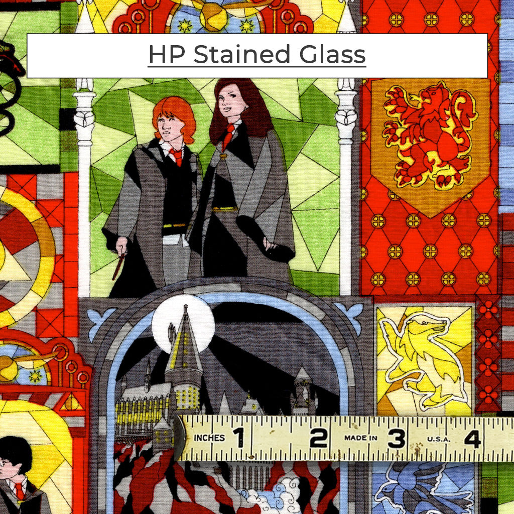 A colorful, stylized stained glass pattern featuring characters and emblems from the Harry Potter series.  Called HP Stained Glass.