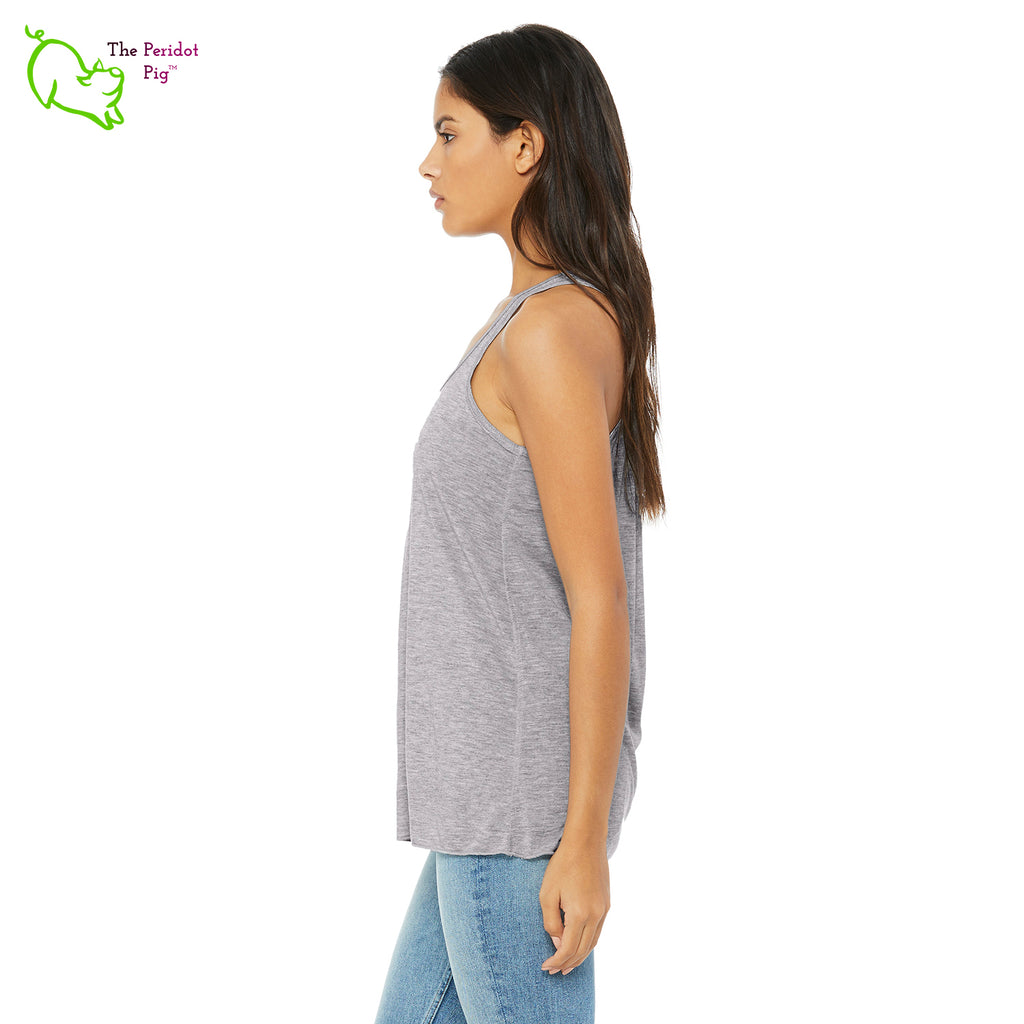 This racerback tank is super soft, lightweight, and form-fitting (but not too tight in the mid-section) with a flattering cut and raw edge seams for an edgy touch. The front features Kristin Zako's logo and the back is blank. Gray side view.