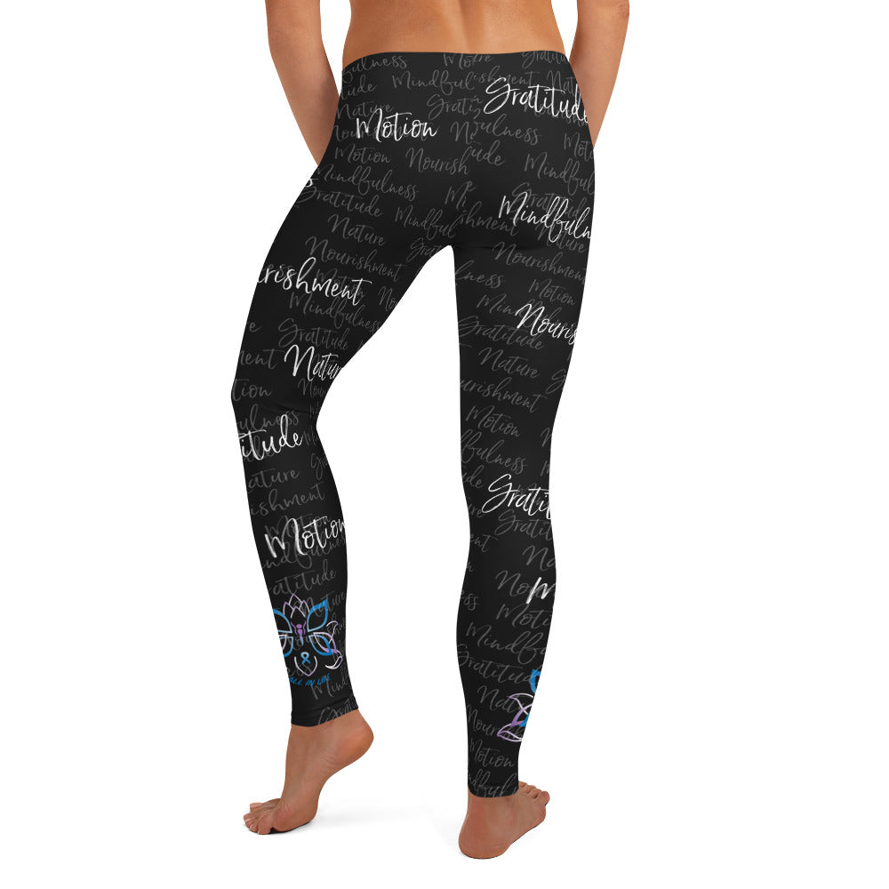 It's hard to compete with Kristin's dino leggings but these might do it! Filled with her four pillars phrases and topped off with her logo on each ankle. Shown in black, back view.