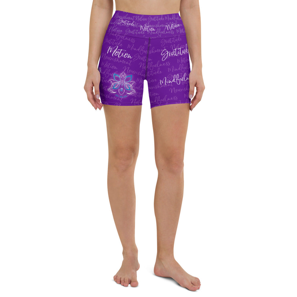 These yoga shorts have a body-flattering fit that will make you feel super comfortable even during the most intense workouts. They come with a high waistband and are made from soft microfiber yarn. The Kristin Zako print is filled with her four pillars phrases and topped off with her logo on the front right leg. Shown in purple. Front view.