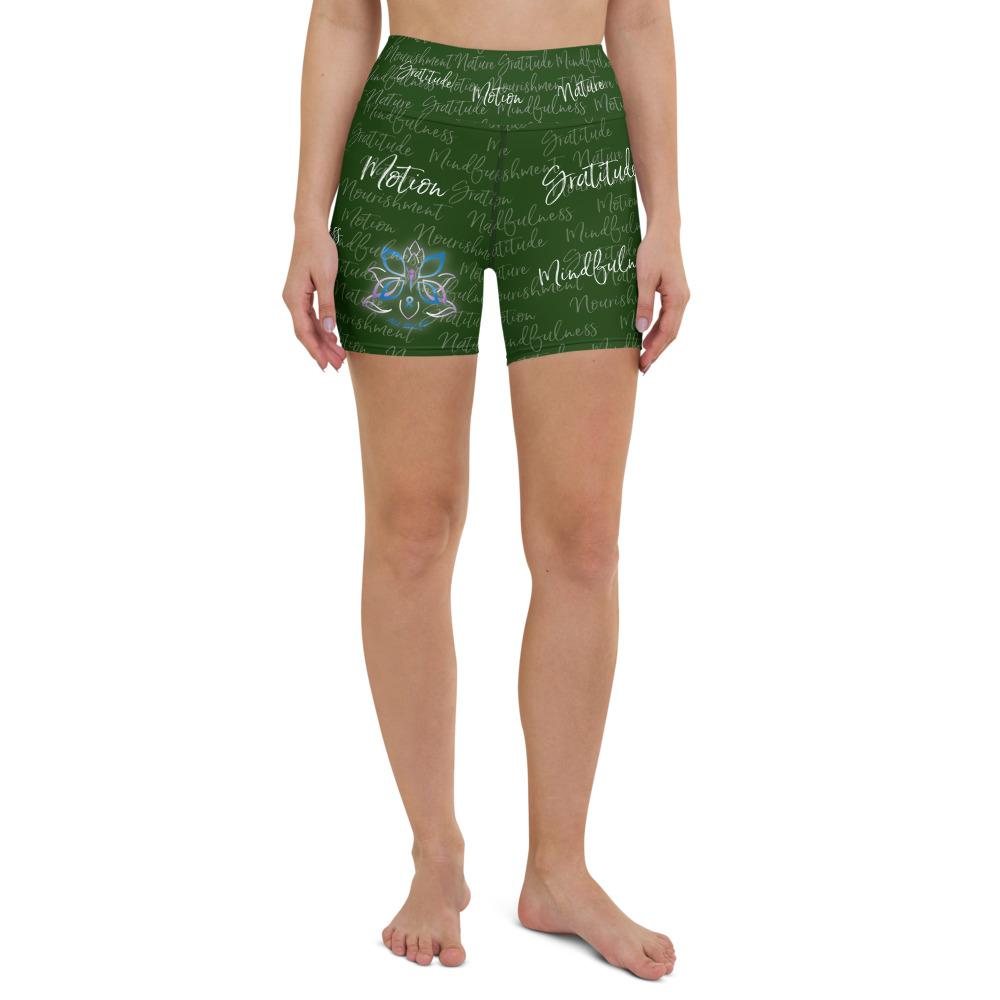 These yoga shorts have a body-flattering fit that will make you feel super comfortable even during the most intense workouts. They come with a high waistband and are made from soft microfiber yarn. The Kristin Zako print is filled with her four pillars phrases and topped off with her logo on the front right leg. Shown in green. Front view.