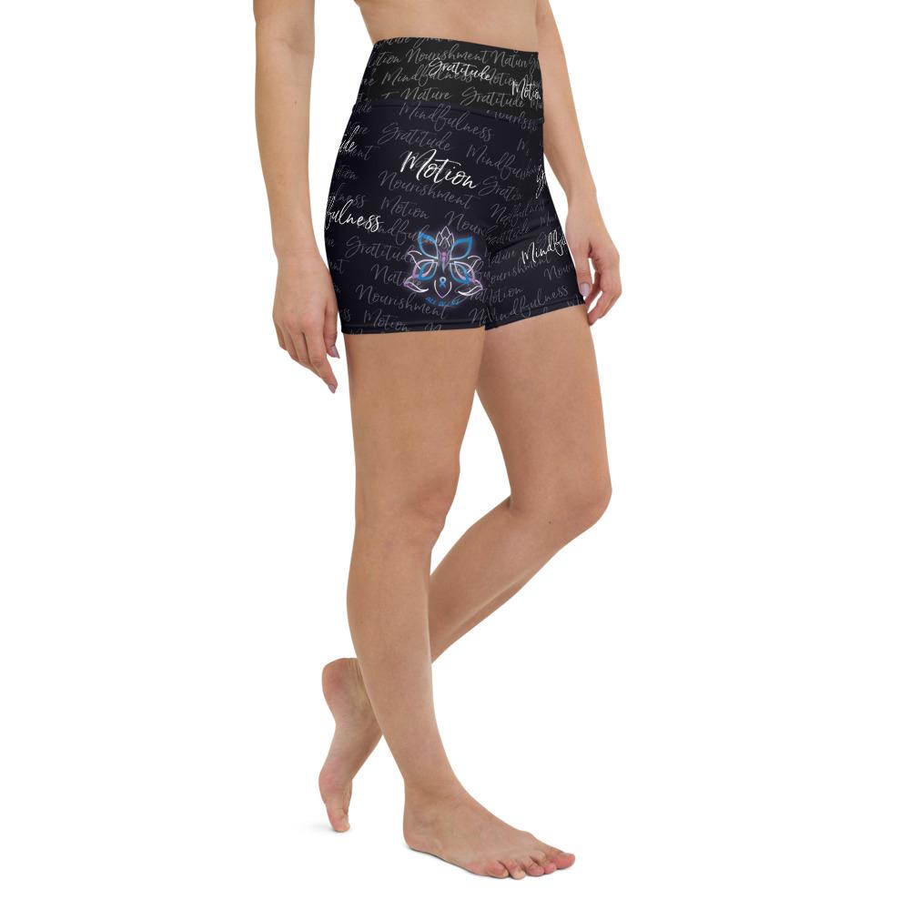 These yoga shorts have a body-flattering fit that will make you feel super comfortable even during the most intense workouts. They come with a high waistband and are made from soft microfiber yarn. The Kristin Zako print is filled with her four pillars phrases and topped off with her logo on the front right leg. Shown in black. Right view.