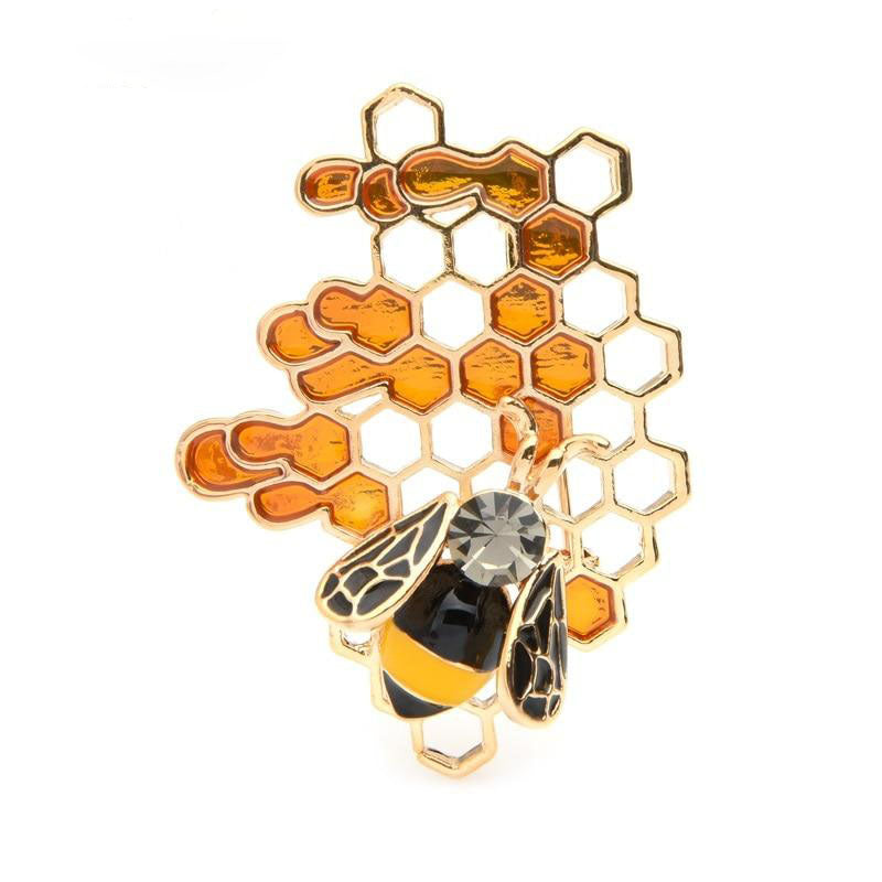 This bee and honeycomb brooch would be a fabulous gift for a bee keeeper. Its  unique design with the enamel filled honeycomb makes it quite modern looking. 