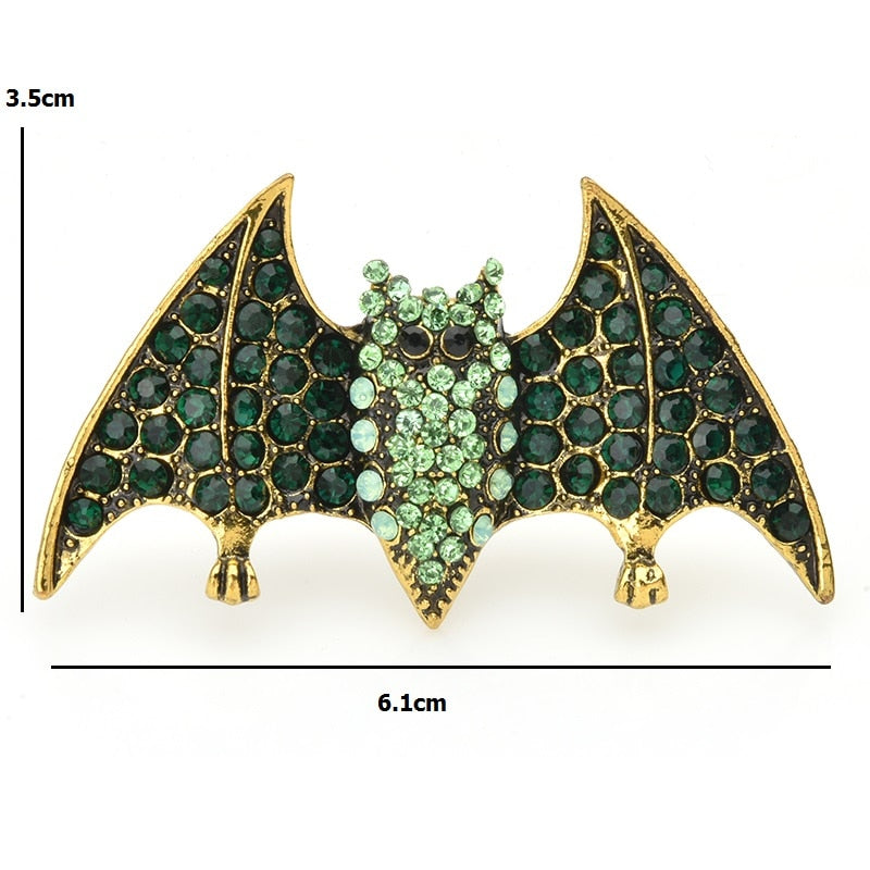 The brooch measures about 2.5" across making this little bat perfect for a hat or lapel. Dimensions are 3.5 x 6.1 cm