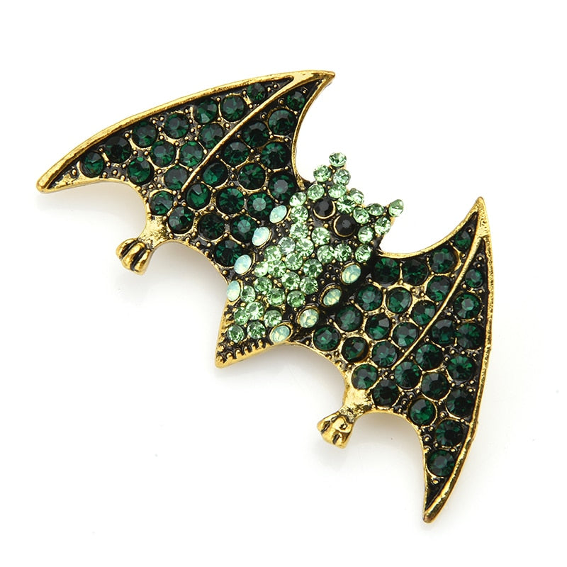 The brooch measures about 2.5" across making this little bat perfect for a hat or lapel.